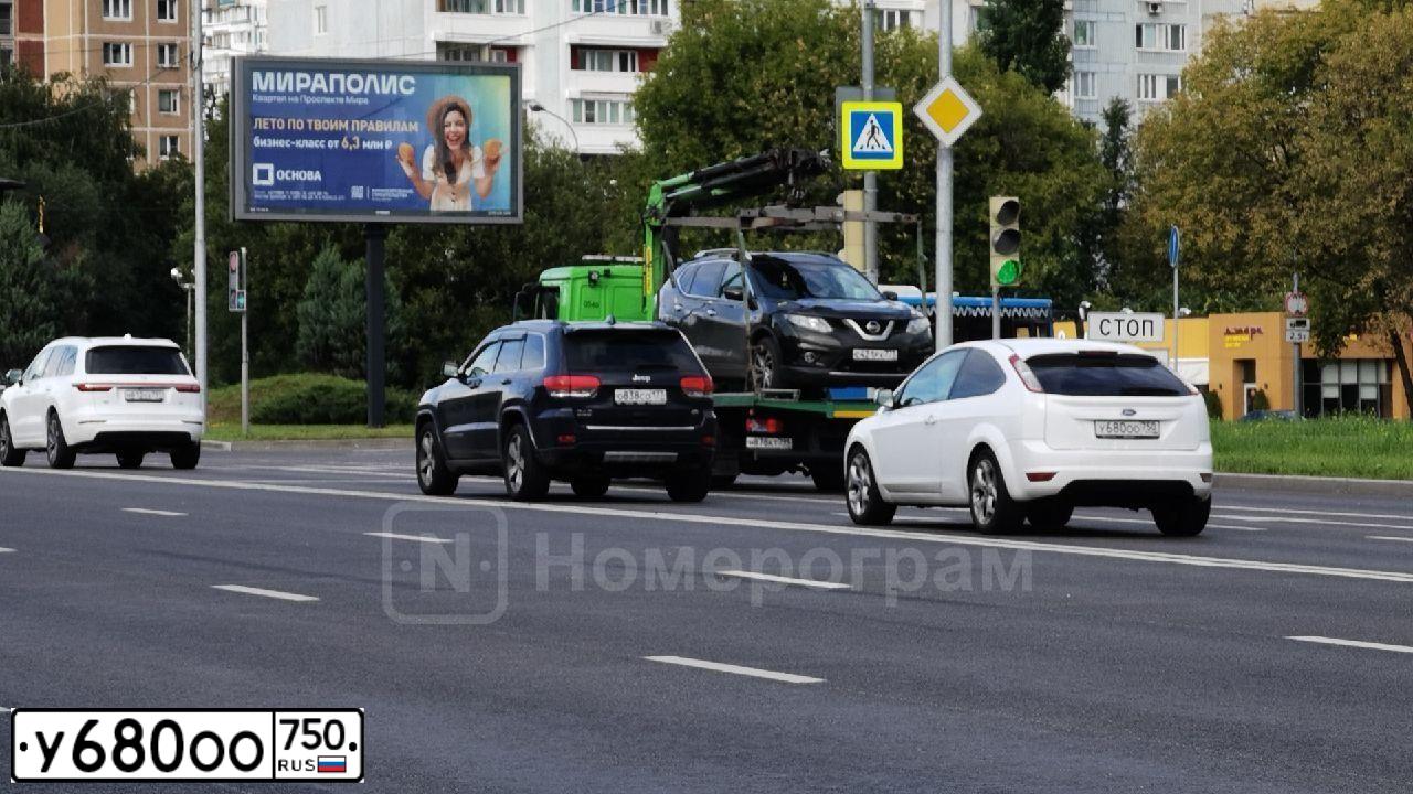 Фото автомобиля FORD FOCUS, 2010 — госномер У680ОО750. Цвет: Белый