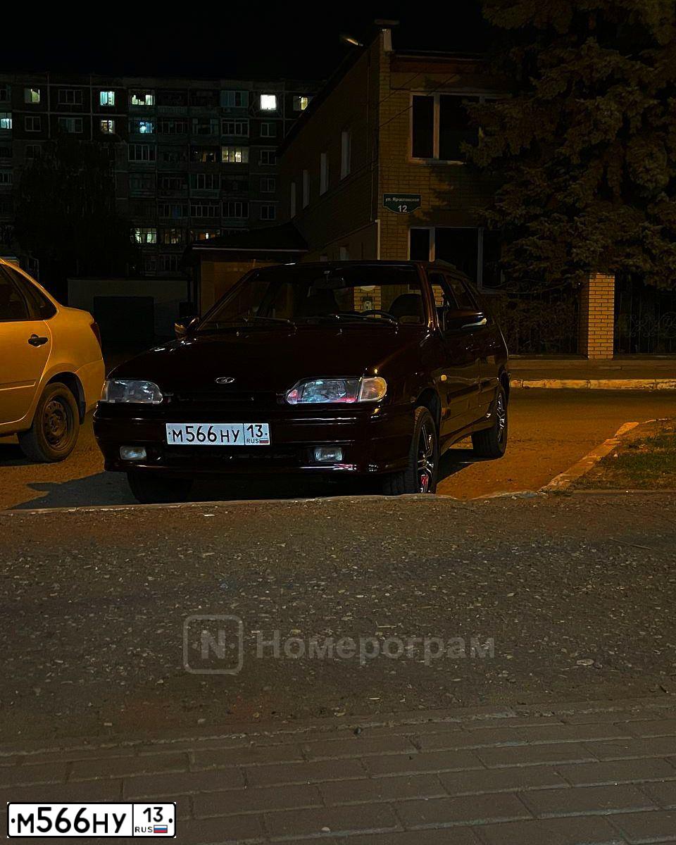 Фото автомобиля LADA 2114 SAMARA, 2013 — госномер М566НУ13. Цвет: ТЕМНО-ВИШНЕВЫЙ