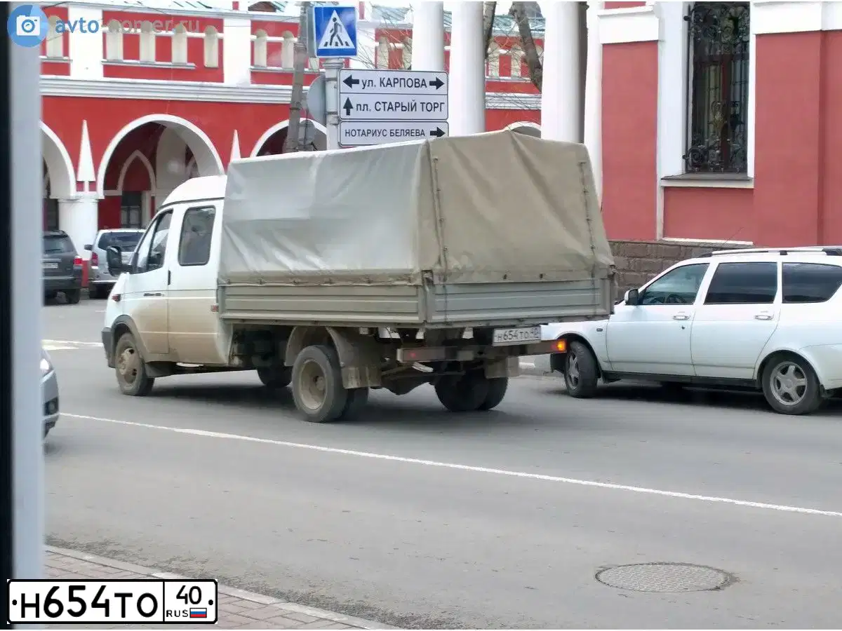 Фото автомобиля GAZ 3302 EL, 2013 — госномер Н957МО40. Цвет: БЕЛЫЙ