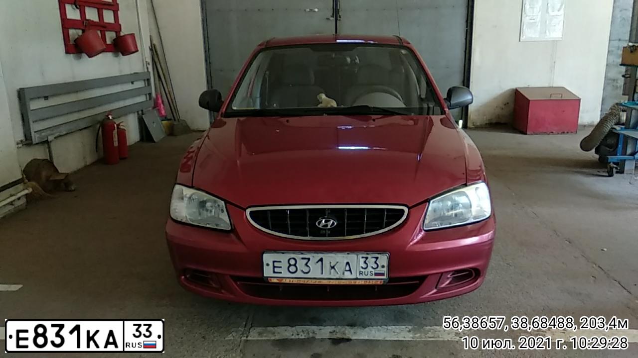Фото автомобиля TAGAZ ACCENT, 2004 — госномер Е831КА33. Цвет: Красный