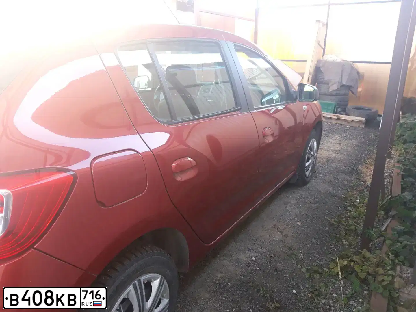 Фото автомобиля RENAULT SANDERO SR, 2015 — госномер Н828ВО550