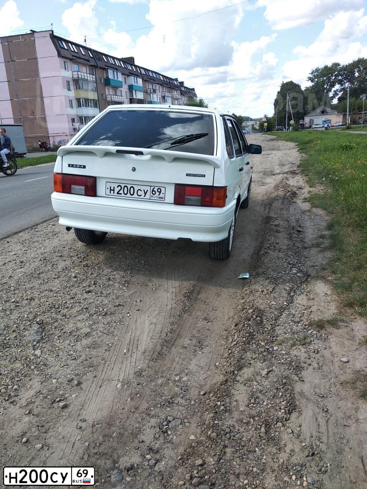 Фото автомобиля LADA 2114 SAMARA, 2013 — госномер Н200СУ69. Цвет: Белый