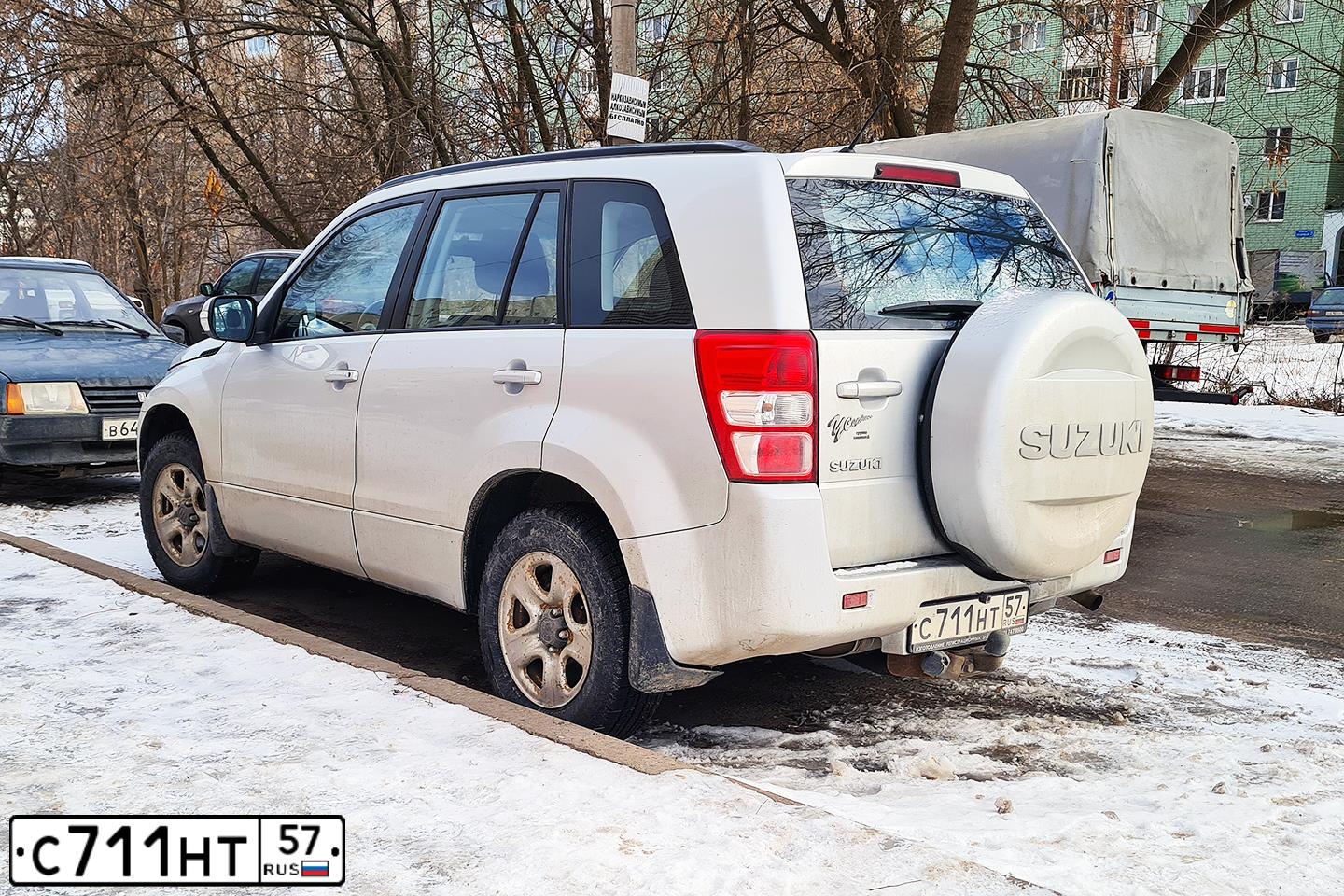 Фото автомобиля SUZUKI /GRAND/ VITARA, 2011 — госномер С711НТ57. Цвет: Серый