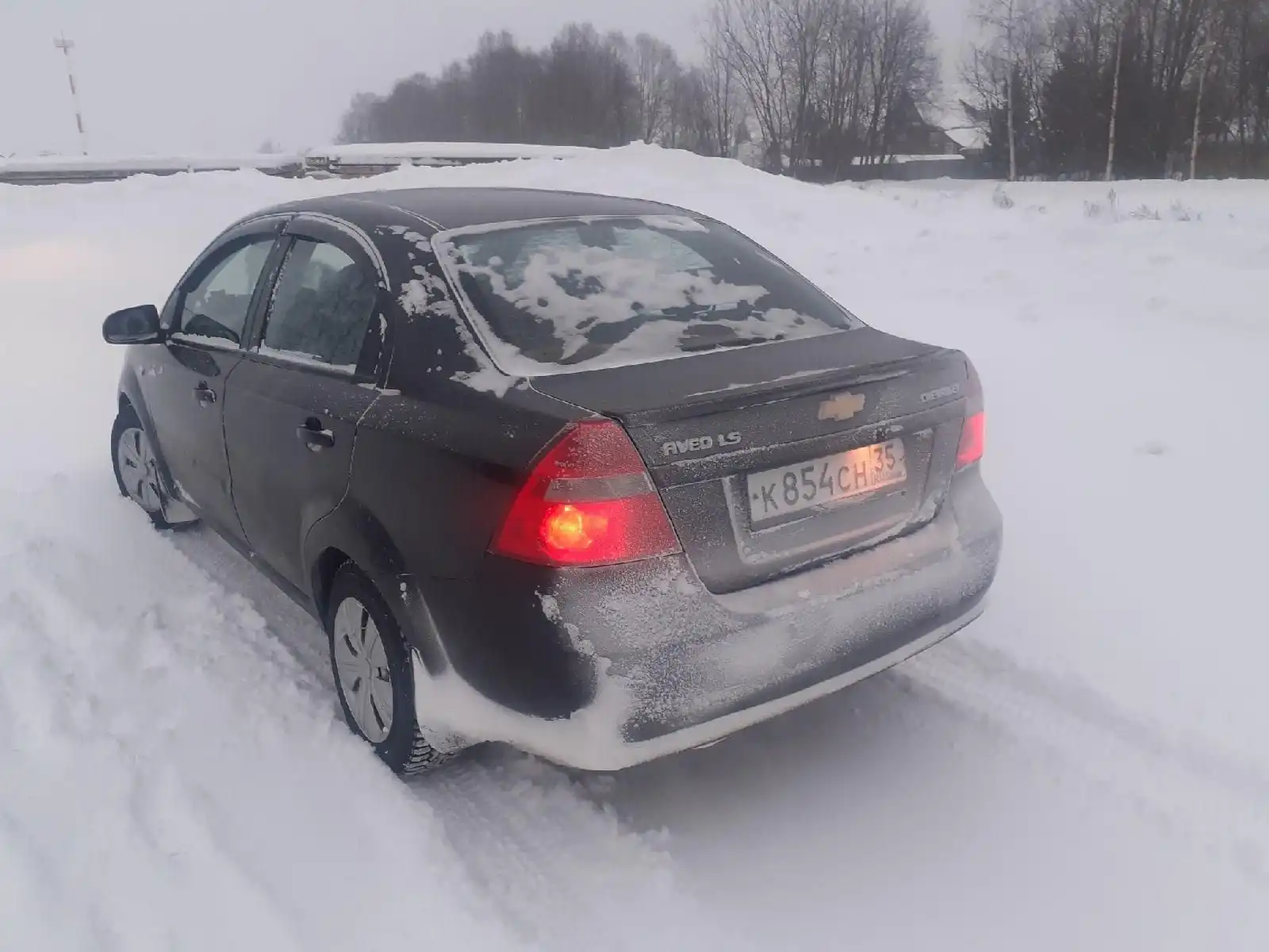 Фото автомобиля CHEVROLET AVEO, 2010 — госномер К745МС76