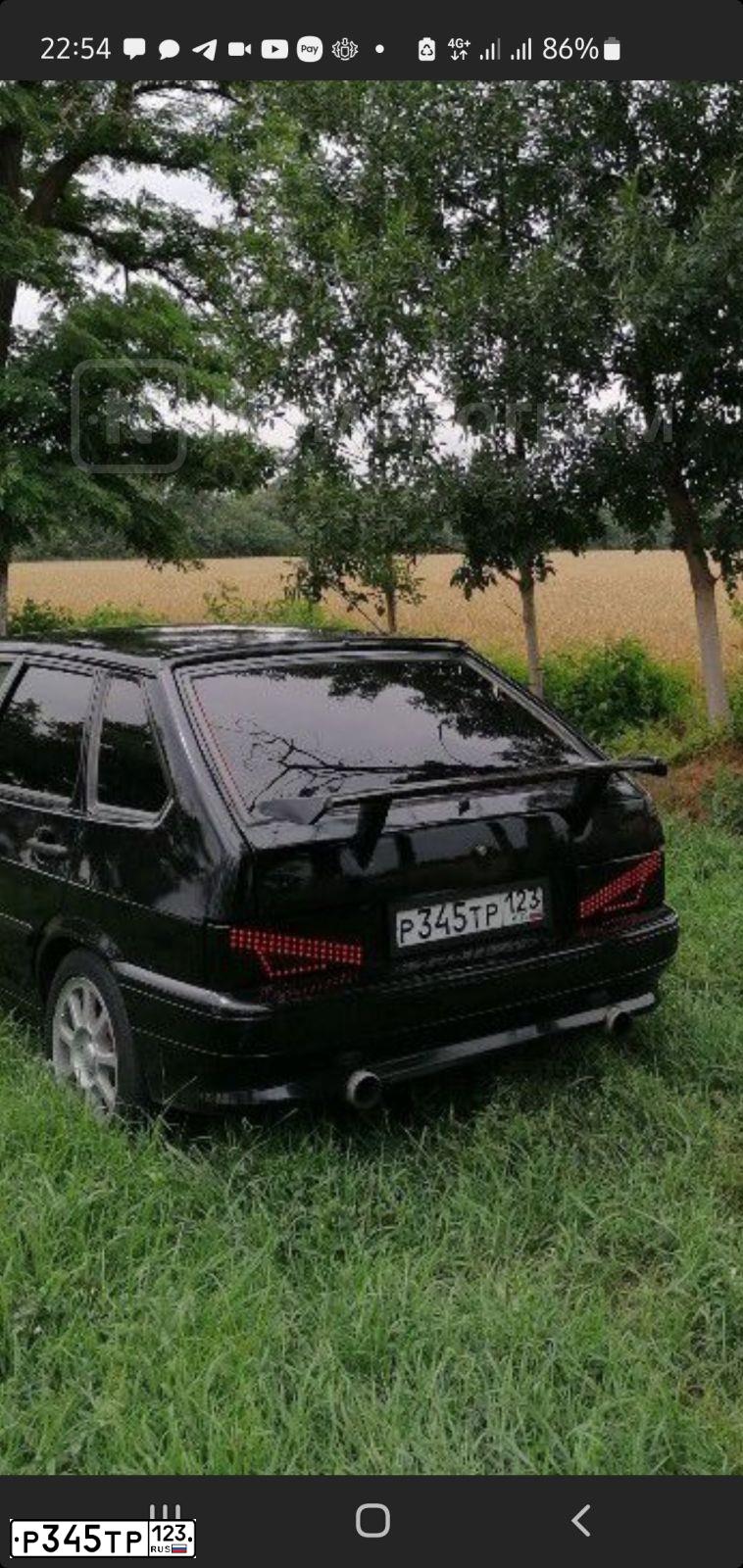 Фото автомобиля LADA 2114 SAMARA, 2008 — госномер Р345ТР123. Цвет: Темно-зеленый
