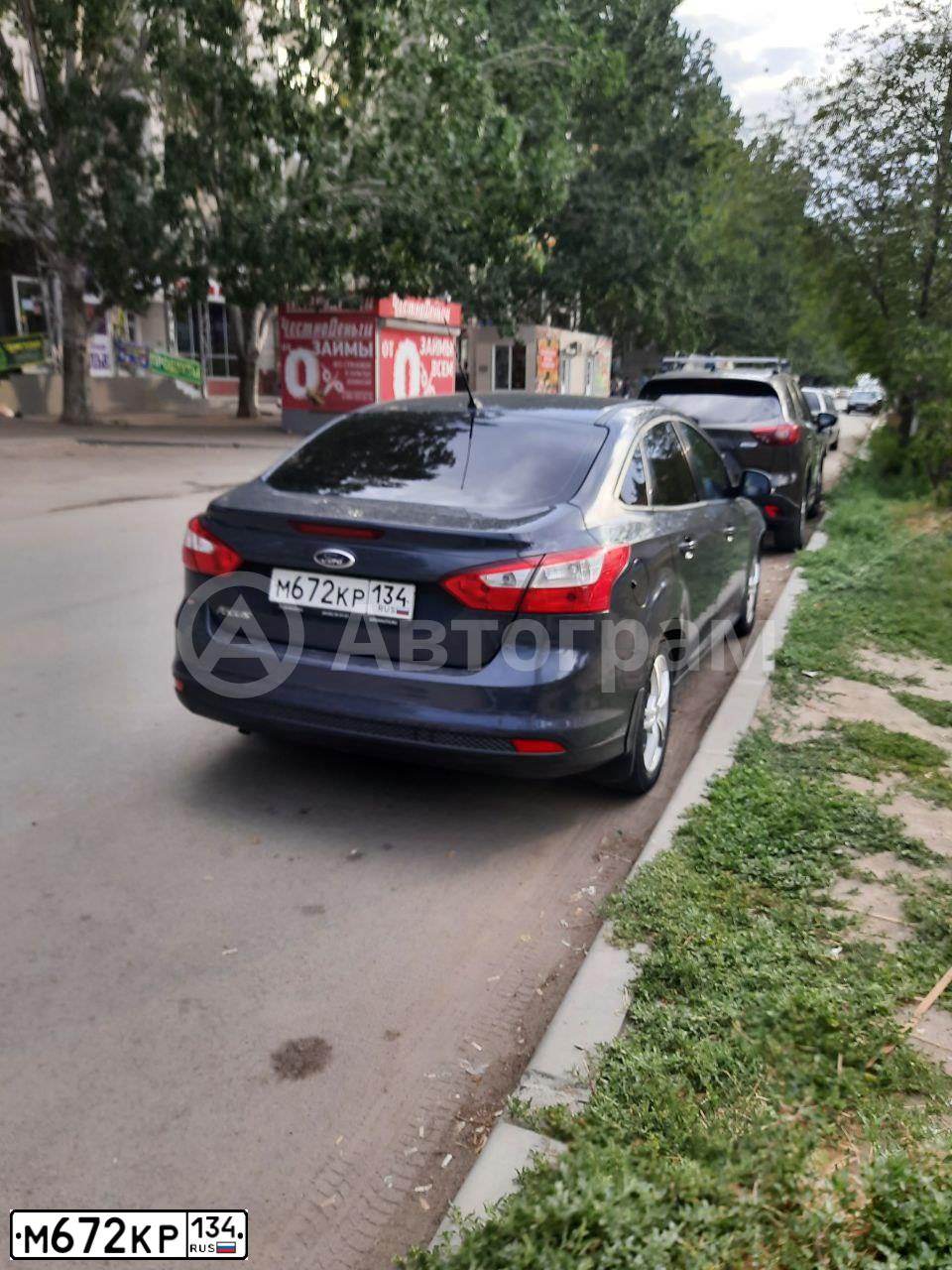 Фото автомобиля FORD FOCUS, 2013 — госномер О426ТО58. Цвет: ТЕМНО СЕРЫЙ