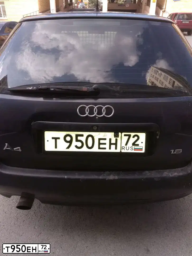 Фото автомобиля AUDI A4, 1997 — госномер Х069НУ72. Цвет: СИНИЙ(ТЕМНО-СИНИЙ)