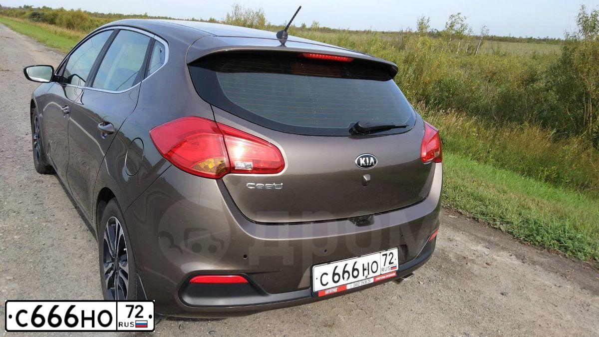 Фото автомобиля KIA CEE'D, 2014 — госномер Х038СЕ72. Цвет: Коричневый