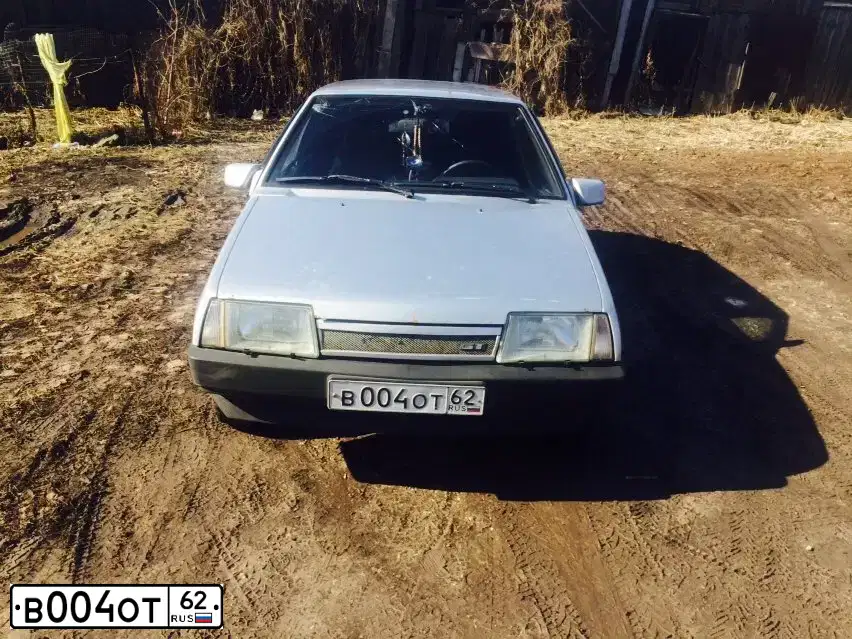 Фото автомобиля LADA 2109 SAMARA, 2003 — госномер В004ОТ62. Цвет: СВЕТЛО-СЕРЕБРИСТЫЙ МЕТАЛЛ