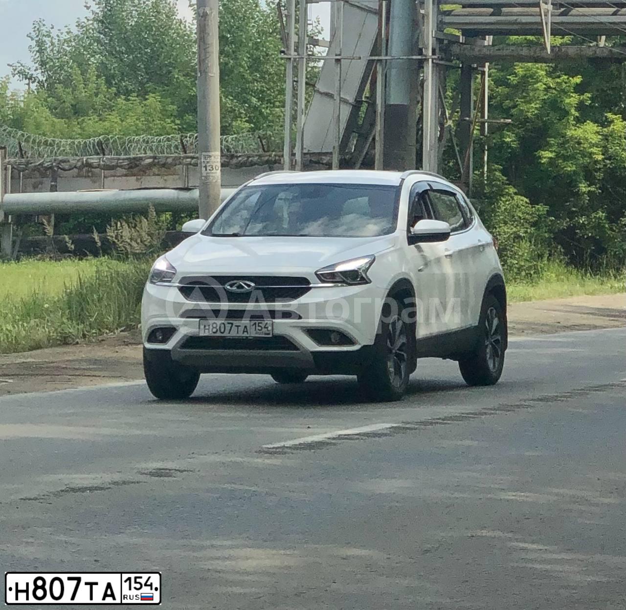 Фото автомобиля CHERY TIGGO, 2019 — госномер Н807ТА154. Цвет: Белый