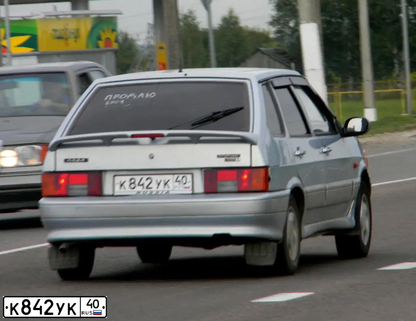 Фото автомобиля LADA 2114 SAMARA, 2004 — госномер Е129РЕ97. Цвет: Серебристо-Желтый