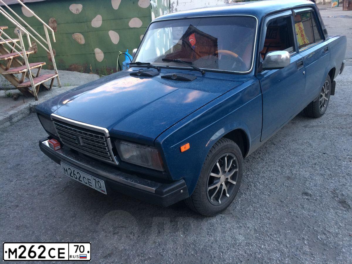 Фото автомобиля LADA 2107 LADA, 2009 — госномер М262СЕ70. Цвет: сине-зеленый