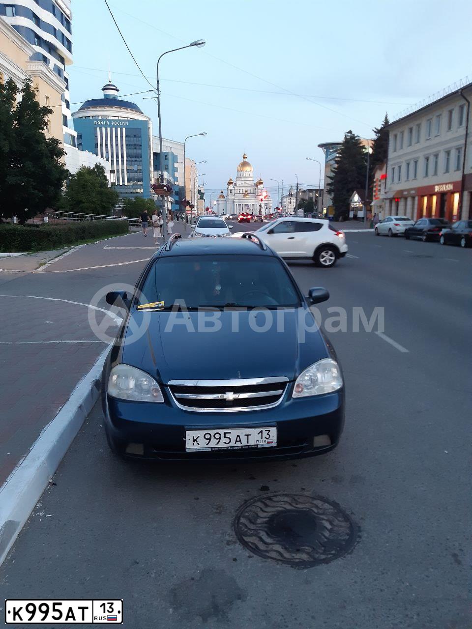 Фото автомобиля CHEVROLET LACETTI, 2008 — госномер К995АТ13. Цвет: СИНИЙ