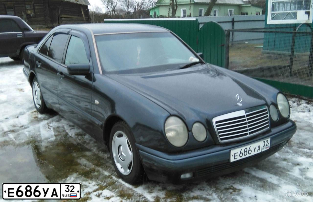 Фото автомобиля MERCEDES E-KLASSE, 1996 — госномер Е686УА32. Цвет: ЧЕРНЫЙ