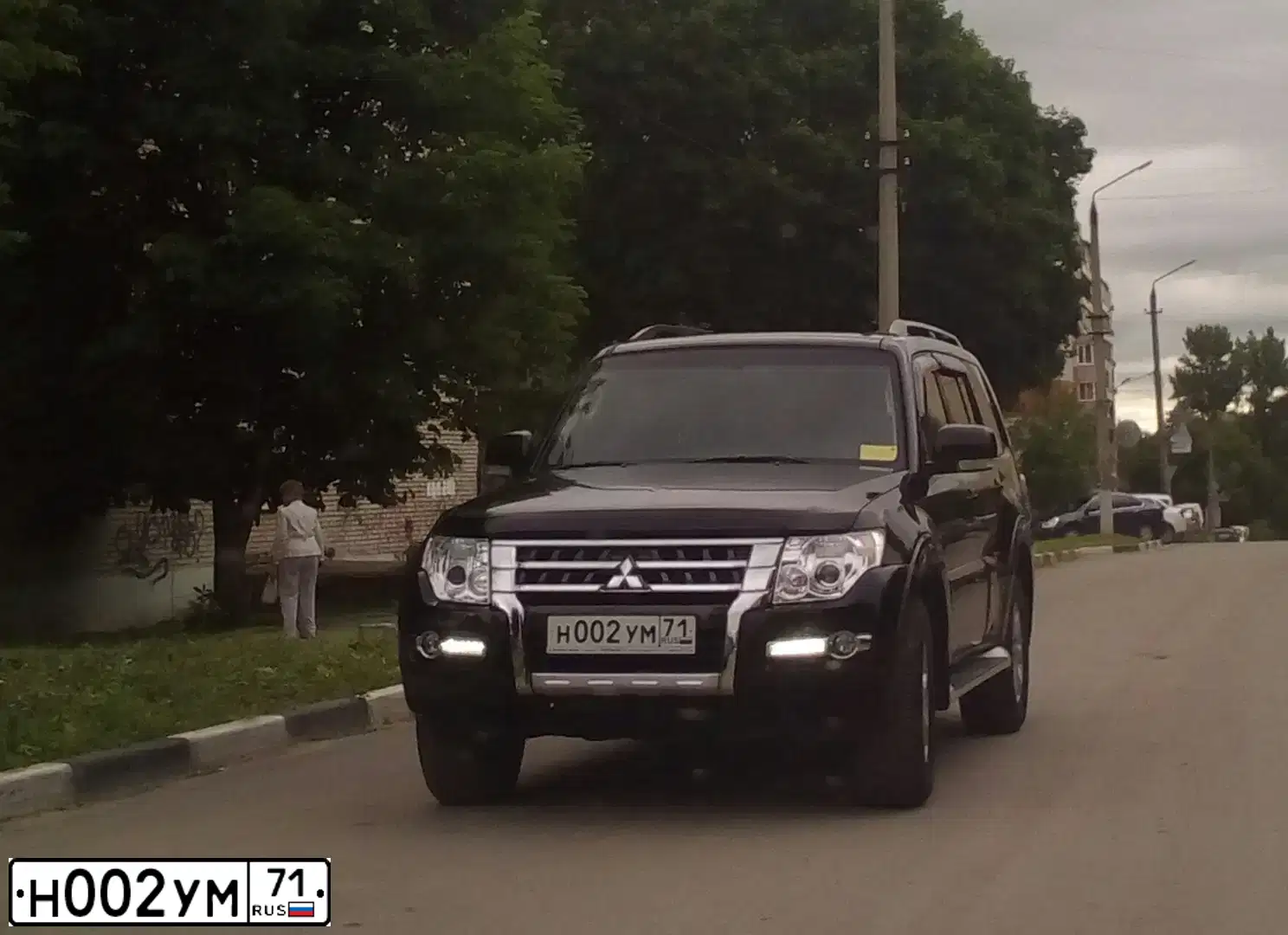 Фото автомобиля MITSUBISHI PAJERO, 2015 — госномер Н002УМ71. Цвет: ЧЕРНЫЙ