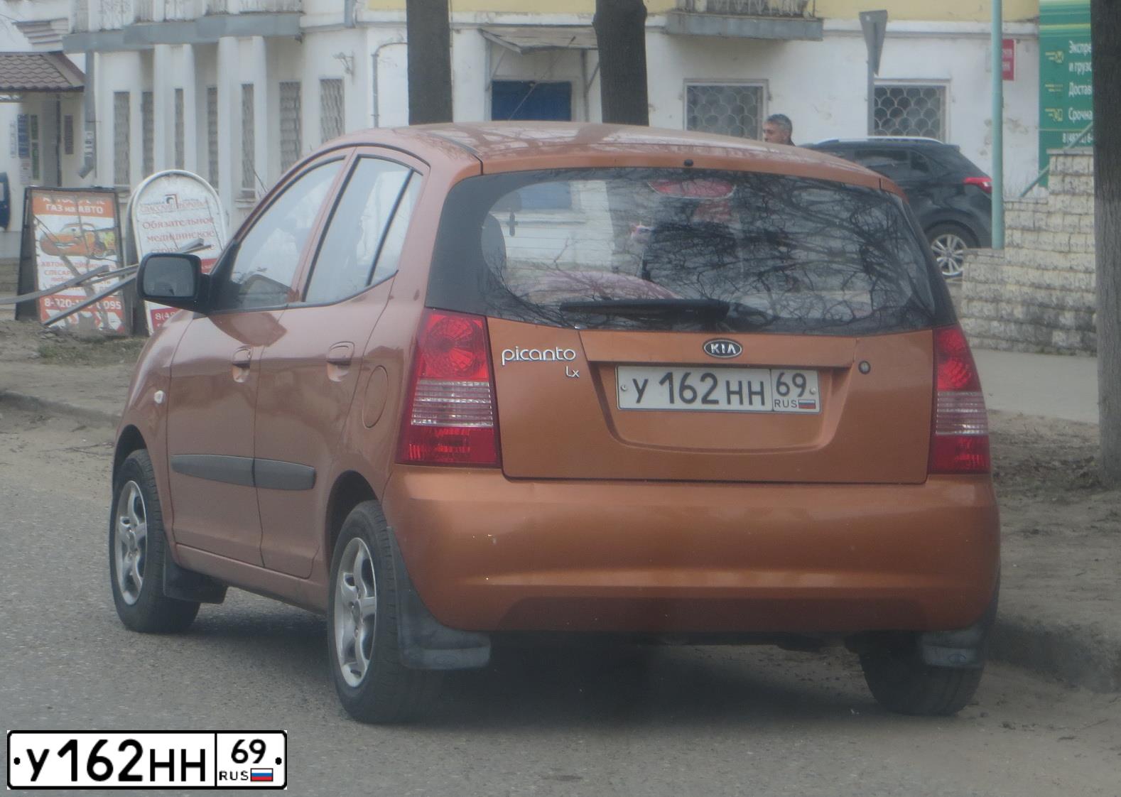 Фото автомобиля KIA PICANTO, 2007 — госномер К191ЕК147. Цвет: Оранжевый