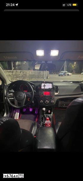 Фото автомобиля KIA CERATO, 2010 — госномер О540АВ180. Цвет: СЕРЫЙ
