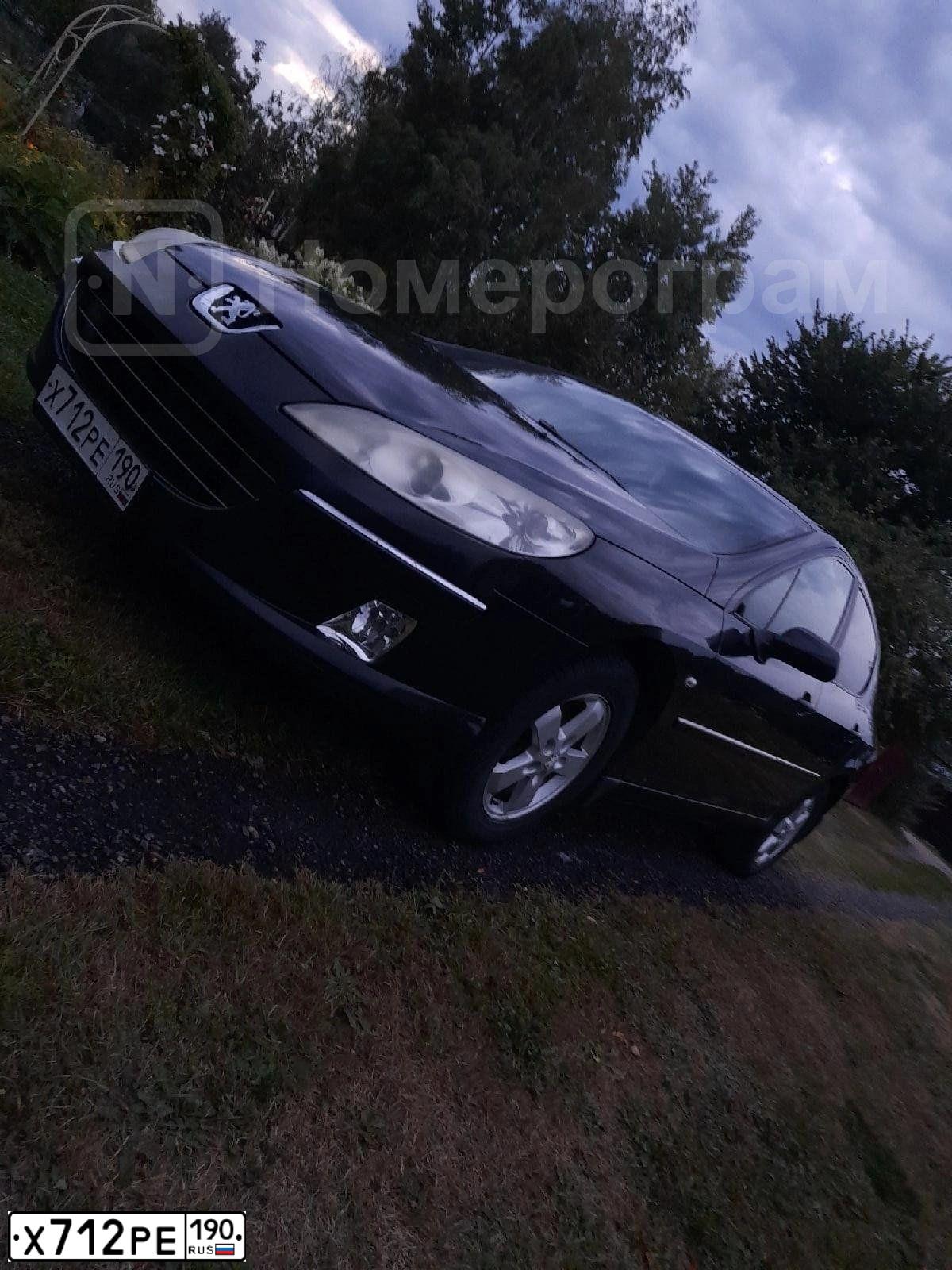 Фото автомобиля PEUGEOT T 407, 2007 — госномер Х712РЕ190. Цвет: ЧЕРНЫЙ
