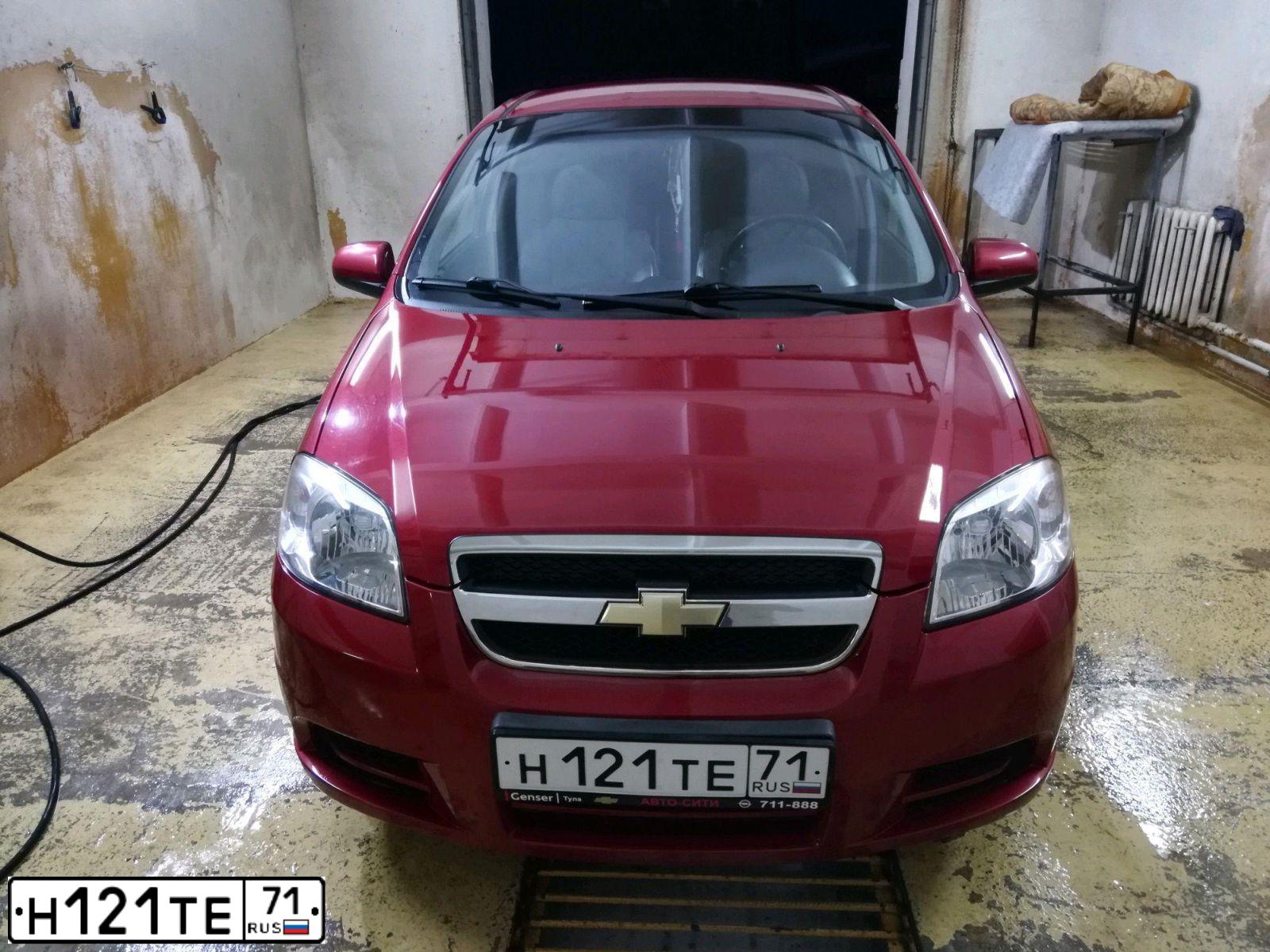Фото автомобиля CHEVROLET AVEO, 2008 — госномер Н121ТЕ71. Цвет: ТЕМНО-КРАСНЫЙ