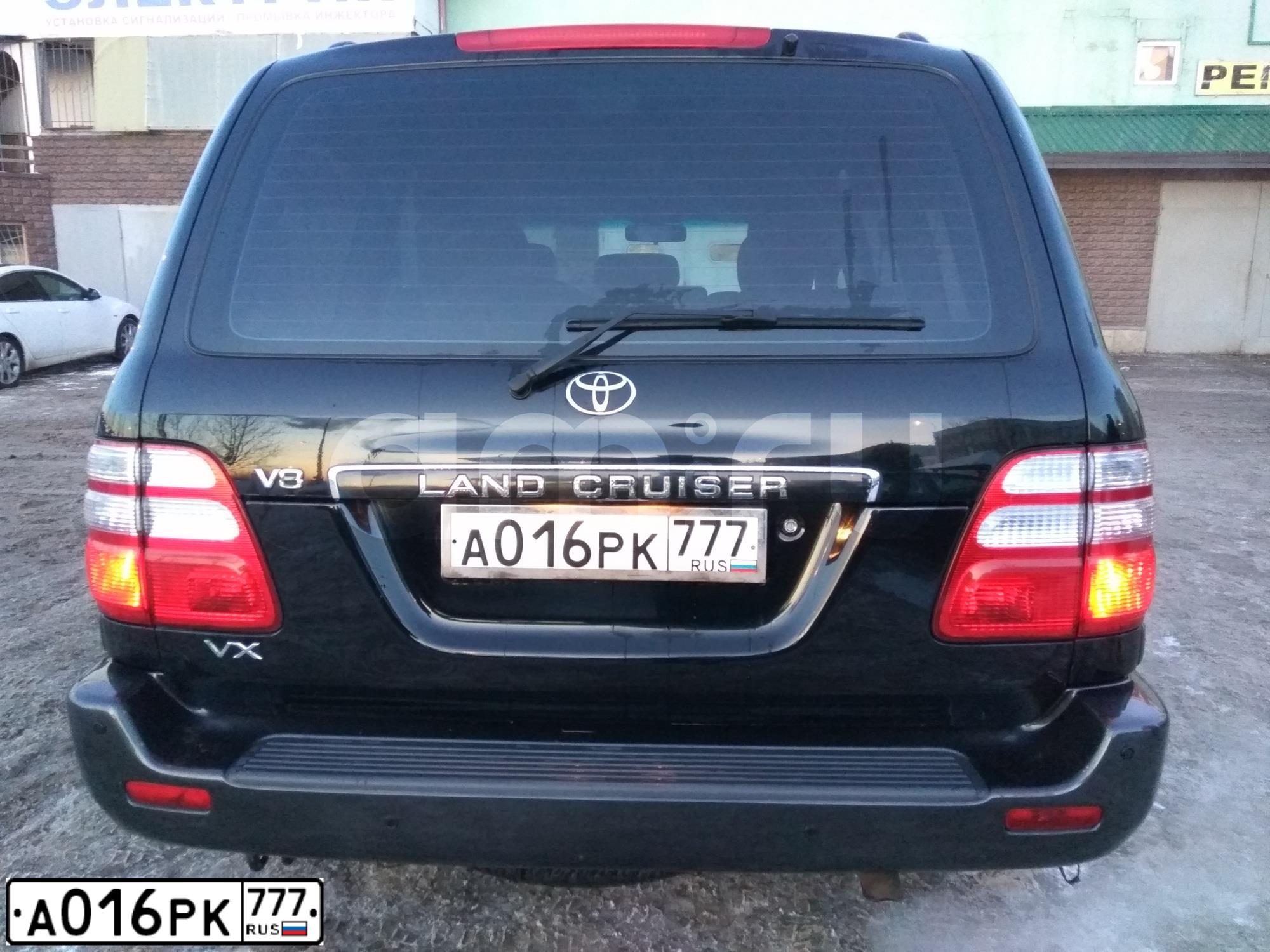 Фото автомобиля TOYOTA LANDCRUISER, 2004 — госномер А016РК777. Цвет: ЧЕРНЫЙ