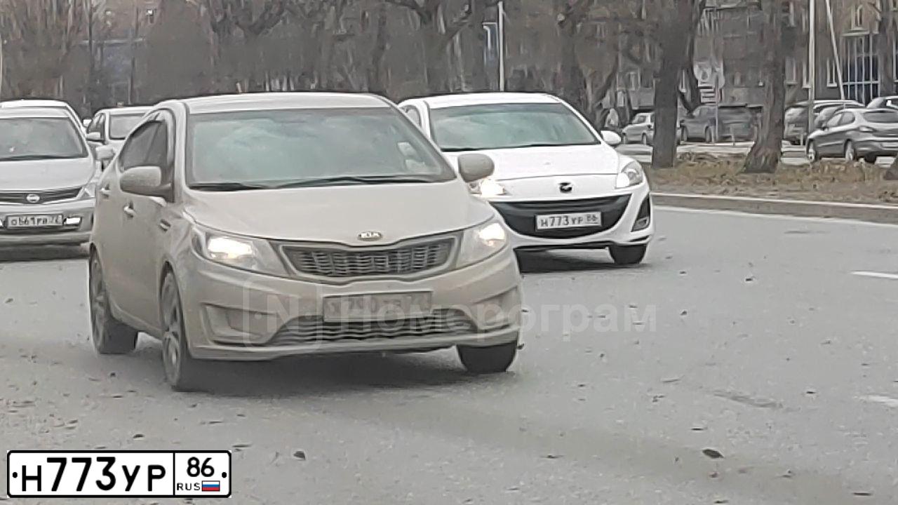 Фото автомобиля MAZDA 3, 2011 — госномер Н773УР86. Цвет: БЕЛЫЙ
