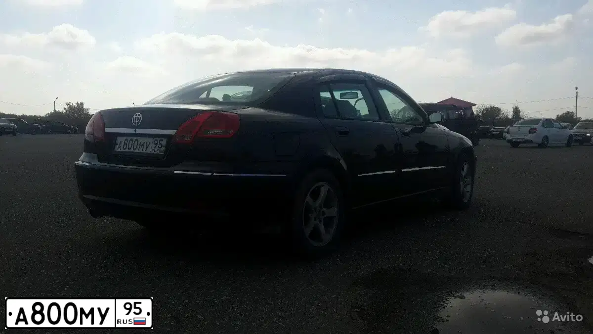 Фото автомобиля BRILLIANCE M 2 /JUNJIE/, 2008 — госномер О404ОК06. Цвет: ЧЕРНЫЙ