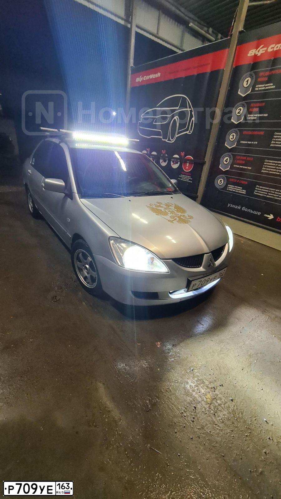 Фото автомобиля MITSUBISHI LANCER, 2005 — госномер Р709УЕ163. Цвет: СЕРЕБРИСТЫЙ