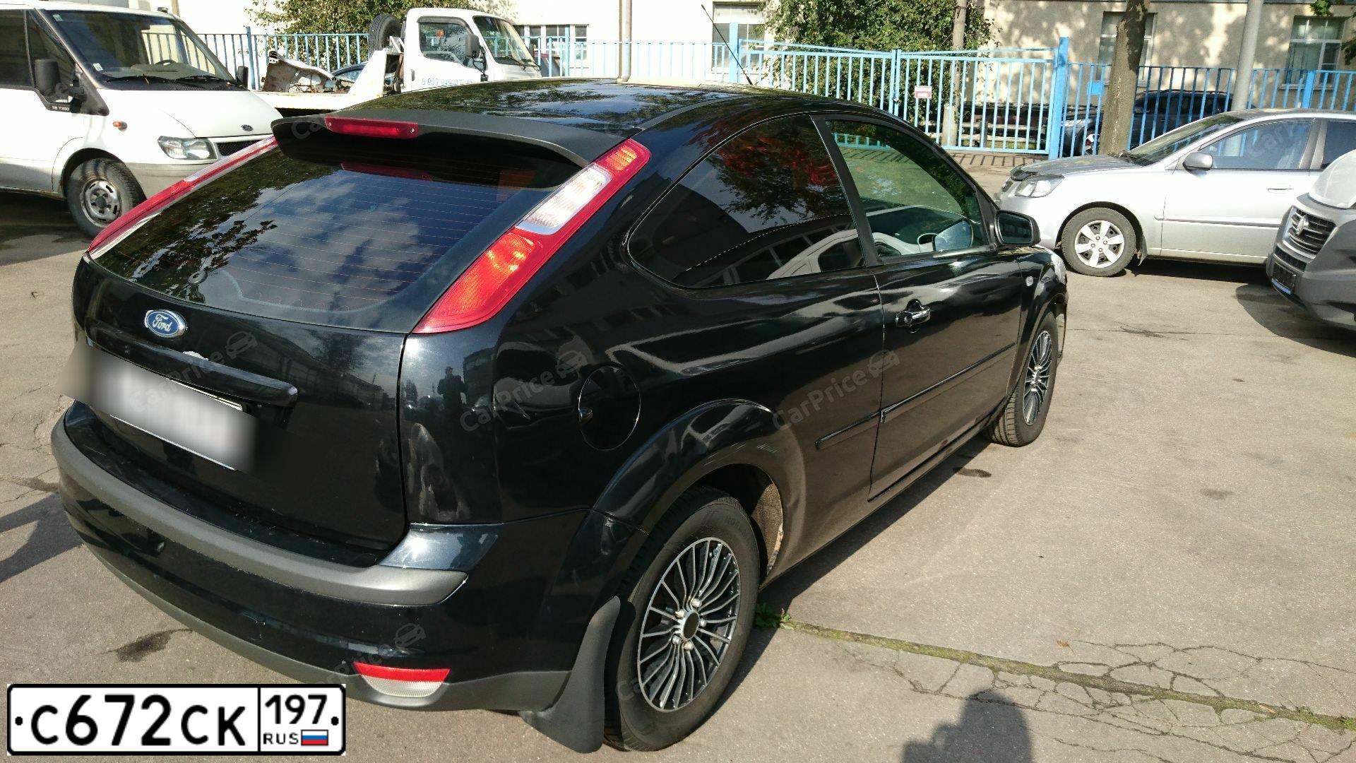 Фото автомобиля FORD D FOCUS, 2006 — госномер Е271РН177. Цвет: ЧЕРНЫЙ