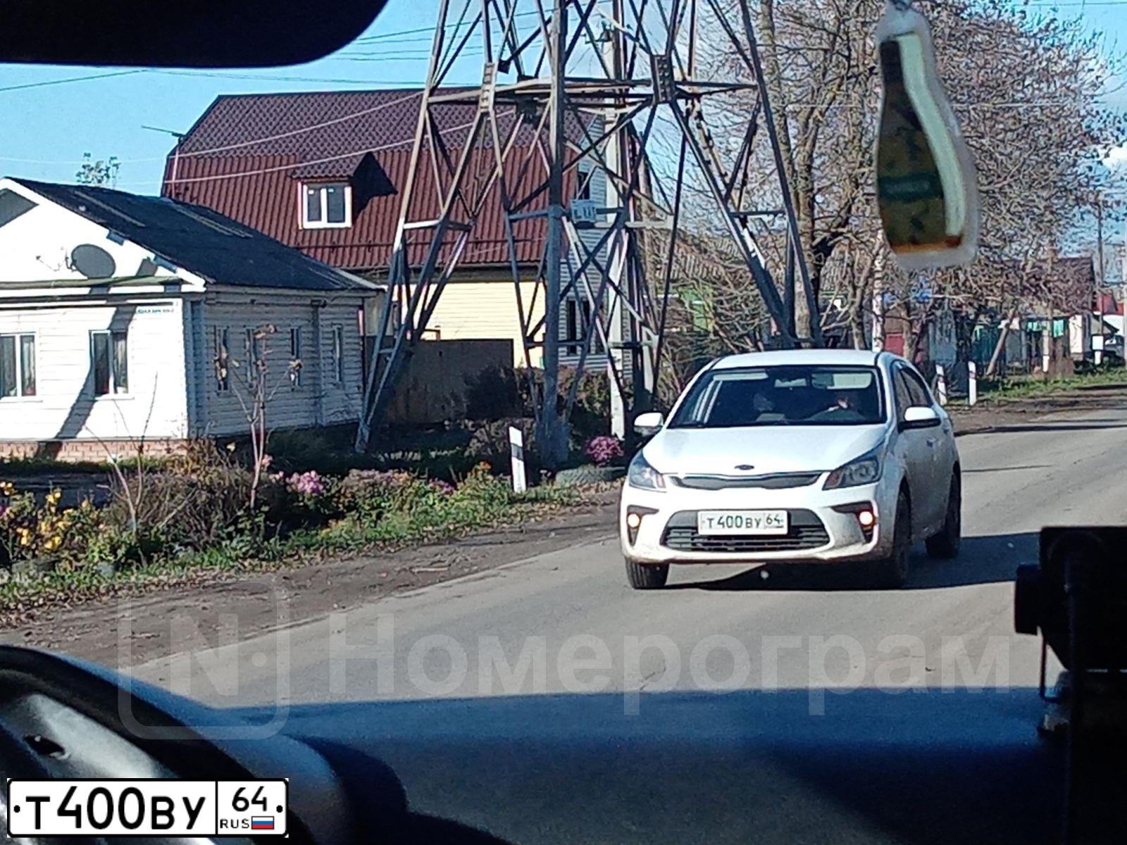 Фото автомобиля KIA RIO, 2015 — госномер В827НМ164. Цвет: ЧЕРНЫЙ