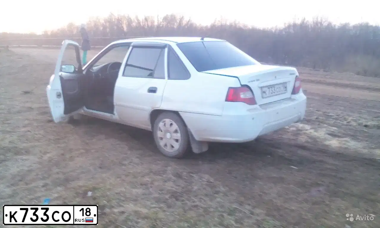 Фото автомобиля DAEWOO NEXIA, 2012 — госномер К733СО18. Цвет: БЕЛО-ДЫМЧАТЫЙ
