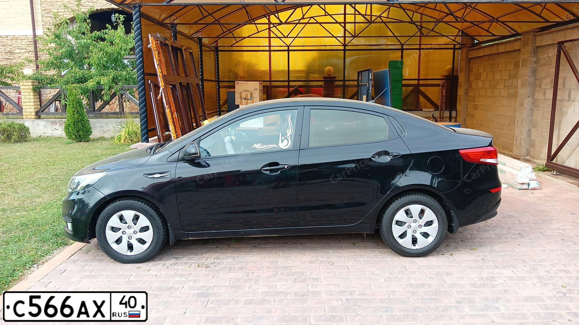 Фото автомобиля KIA RIO, 2015 — госномер С566АХ40. Цвет: ЧЕРНЫЙ
