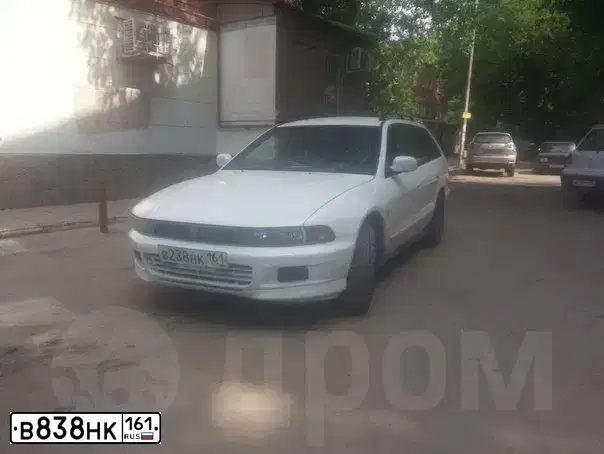 Фото автомобиля OPEL ASTRA, 2011 — госномер В838НК161. Цвет: Серебристый