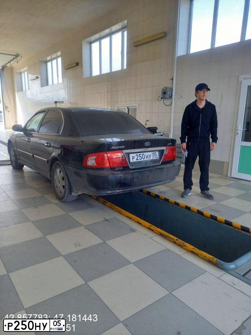 Фото автомобиля KIA MAGENTIS / OPTIMA, 2006 — госномер М585ВХ99. Цвет: ЧЕРНЫЙ