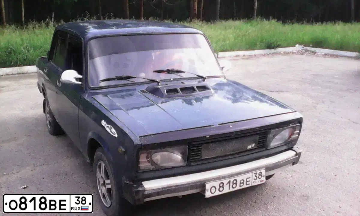 Фото автомобиля LADA 2105, 1997 — госномер О818ВЕ38. Цвет: ЗЕЛЕНЫЙ