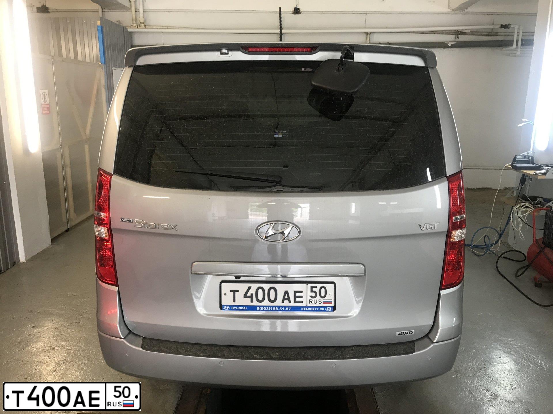 Фото автомобиля HYUNDAI GRAND STAREX, 2013 — госномер О969КН44. Цвет: ЧЕРНЫЙ
