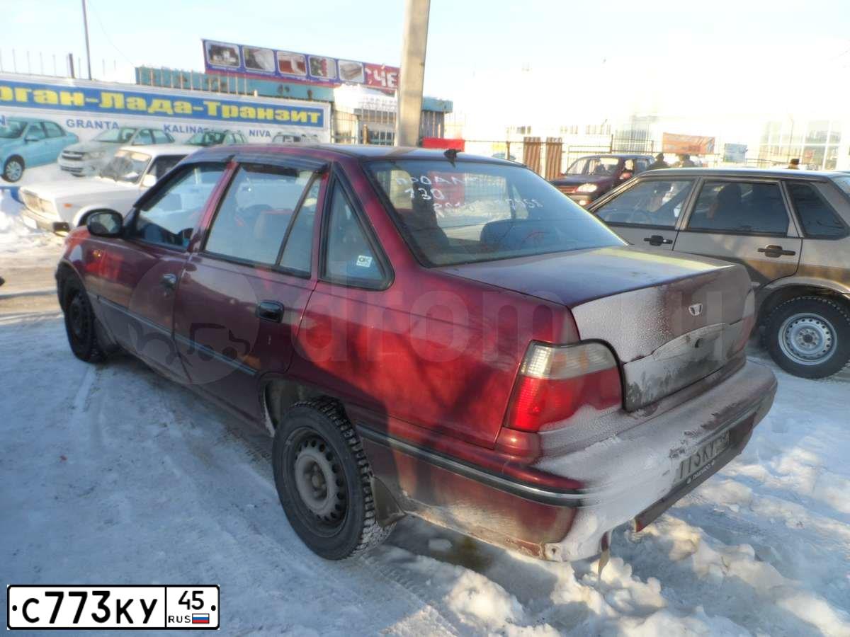 Фото автомобиля DAEWOO NEXIA, 2007 — госномер Е639ХЕ72. Цвет: ВИШНЕВЫЙ