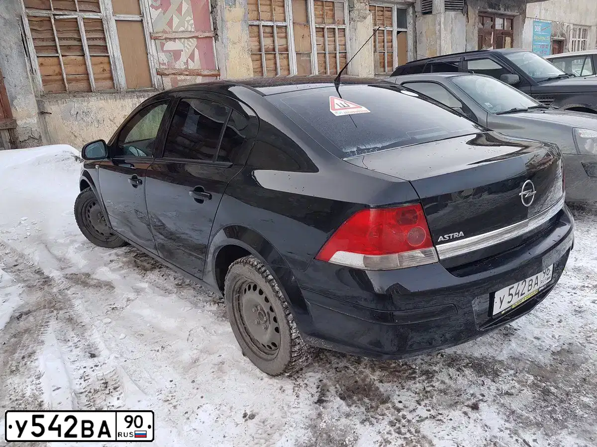 Фото автомобиля ГАЗ 3110, 2001 — госномер Н998НО36. Цвет: Белый
