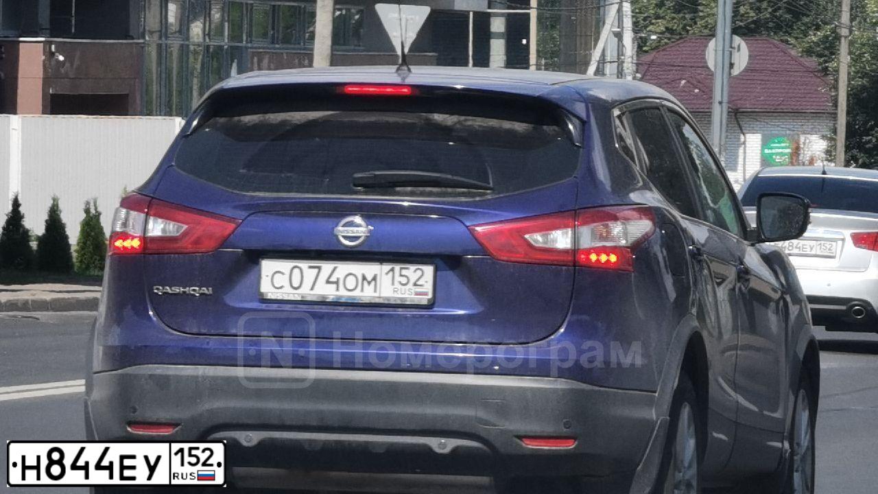 Фото автомобиля MITSUBISHI LANCER, 2005 — госномер Н324РУ21. Цвет: ЧЕРНЫЙ
