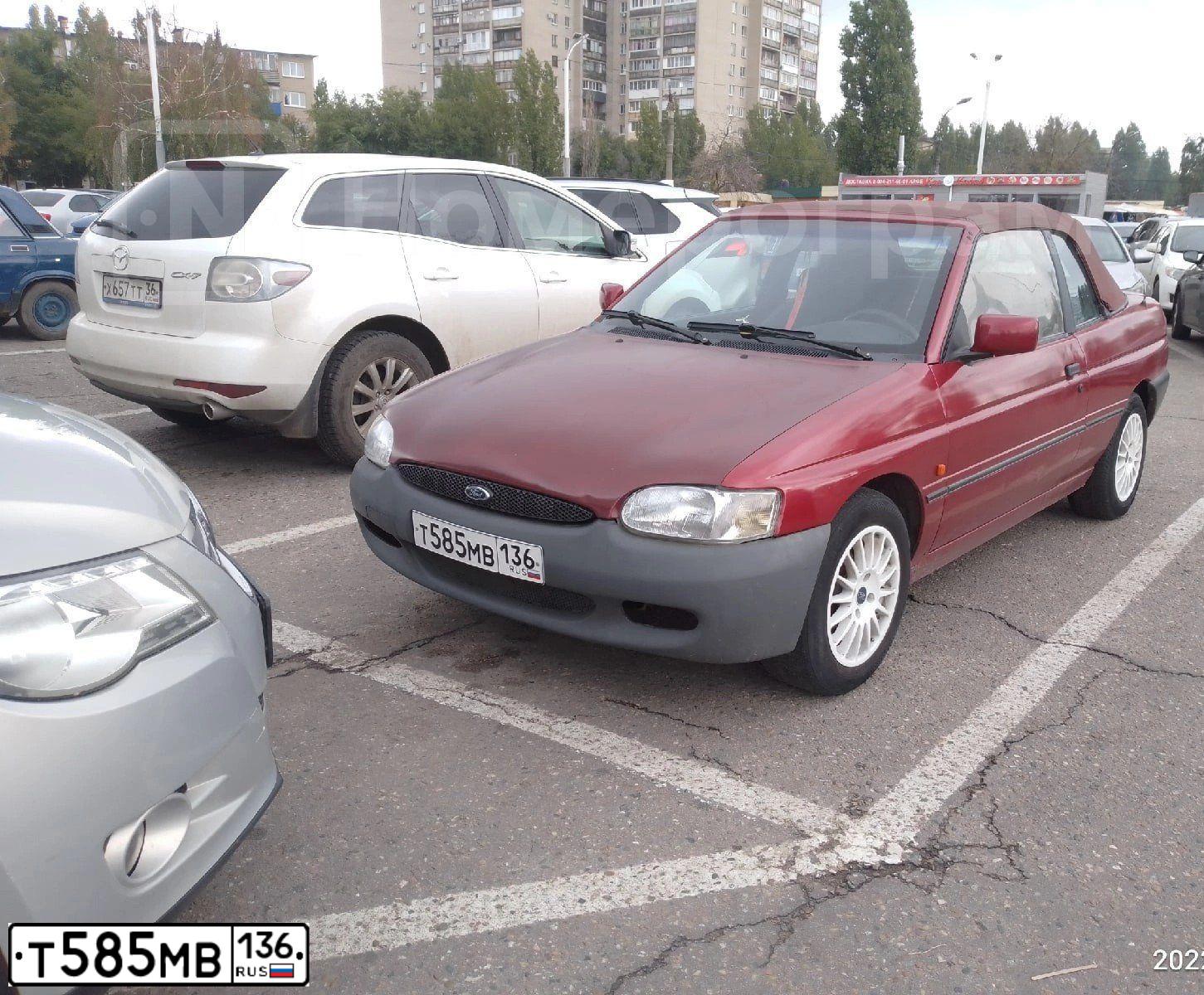 Фото автомобиля FORD ESCORT, 1992 — госномер Т585МВ136. Цвет: Красный