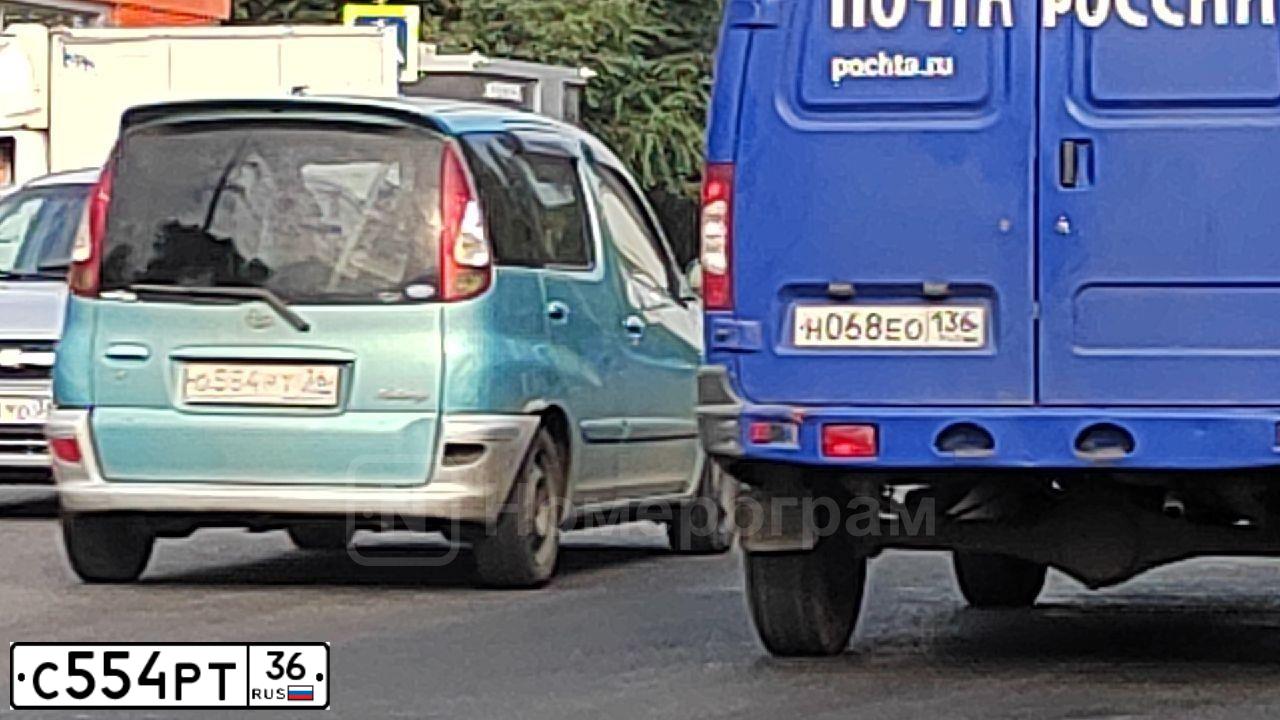 Фото автомобиля VAZ ЛАДА 111730, 2009 — госномер С554РТ36. Цвет: Серебристый