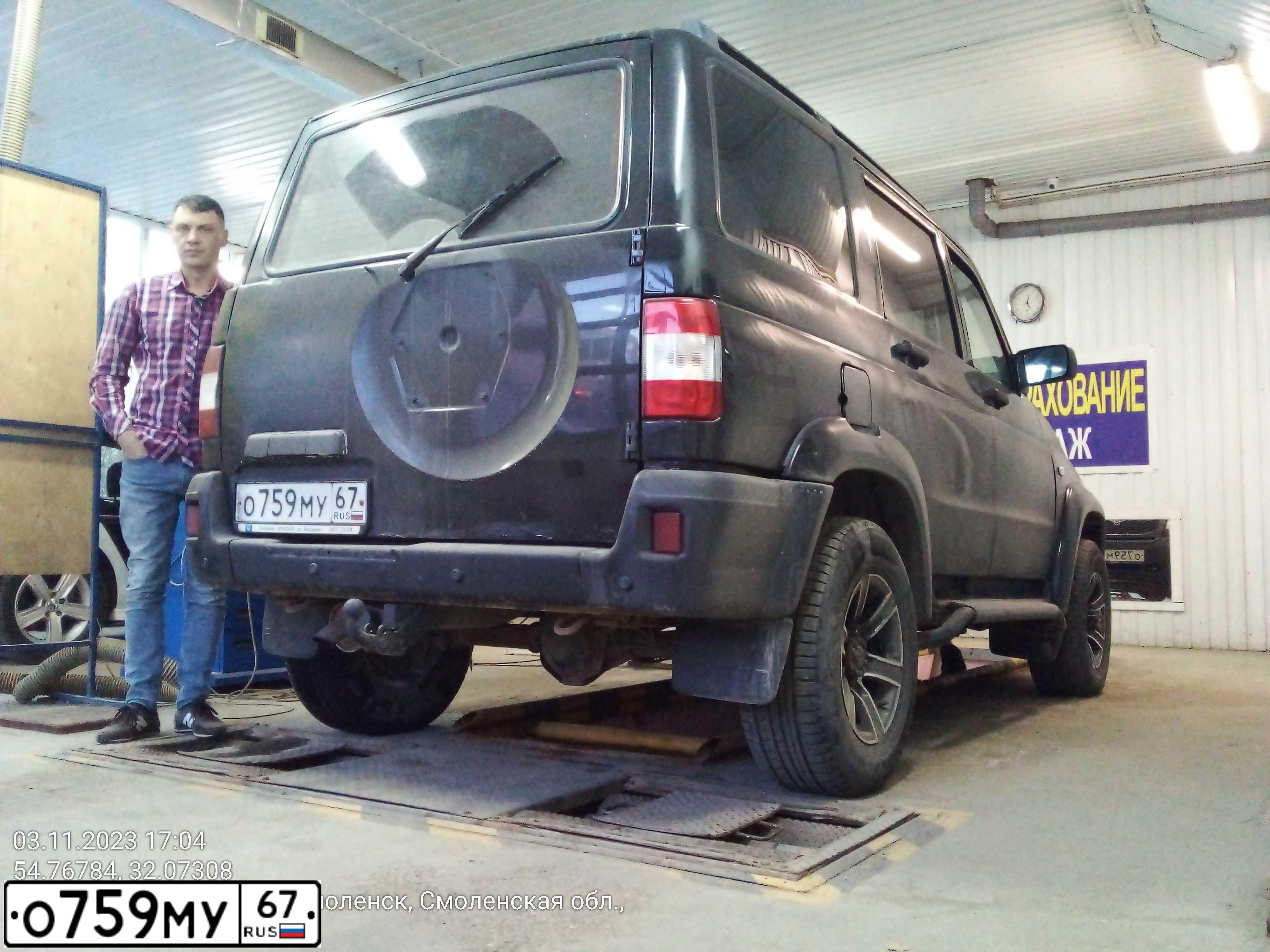 Фото автомобиля UAZ PATRIOT, 2012 — госномер Р349ЕА32. Цвет: ЧЕРНЫЙ