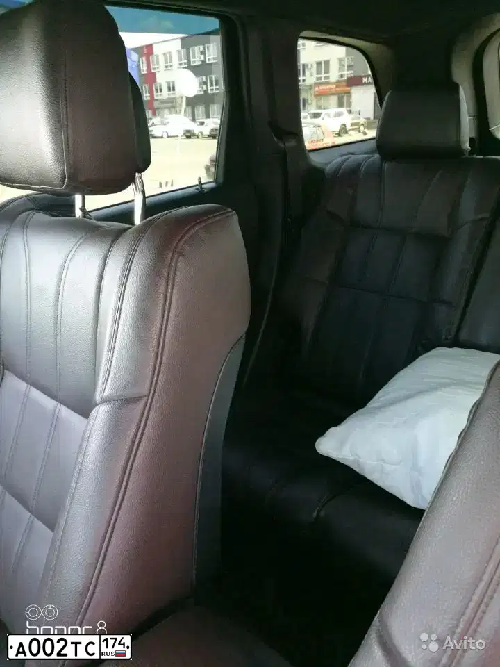Фото автомобиля JEEP GRAND CHEROKEE, 2013 — госномер А002ТС174. Цвет: ЧЕРНЫЙ