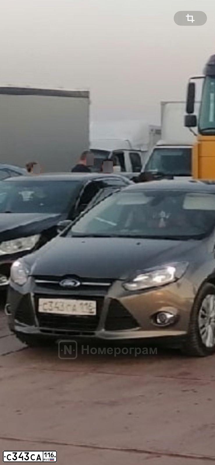 Фото автомобиля FORD FOCUS, 2013 — госномер С343СА116. Цвет: СЕРО-КОРИЧНЕВЫЙ