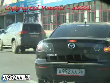 Фото автомобиля MAZDA 3, 2008 — госномер А952АА36. Цвет: ЧЕРНЫЙ