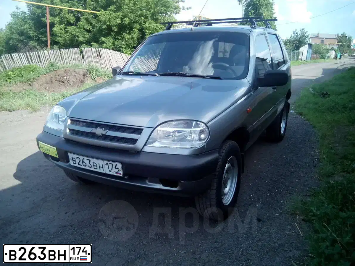 Фото автомобиля ШЕВРОЛЕ НИВА 212300, 2008 — госномер В431НА702. Цвет: Темно-серый металлик