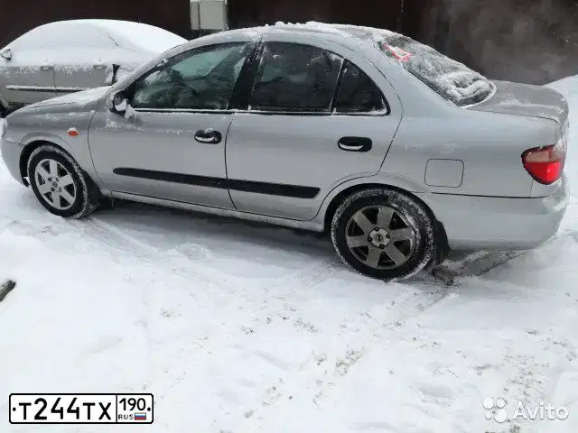 Фото автомобиля НИССАН АЛЬМЕРА, 2004 — госномер В085ОС761. Цвет: СЕРЕБРИСТЫЙ