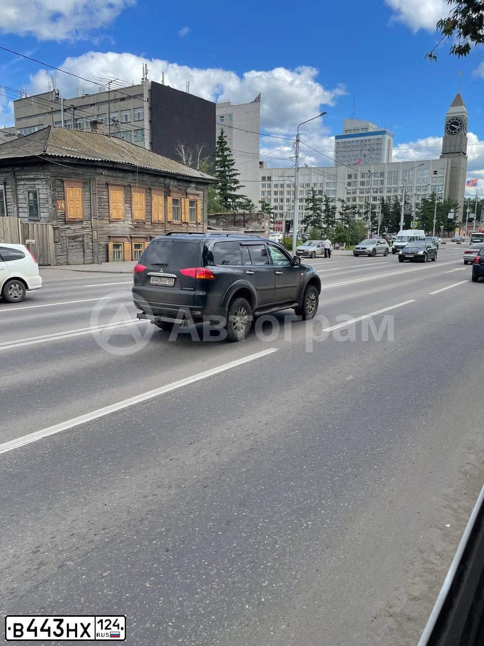 Фото автомобиля MITSUBISHI PAJERO SPORT, 2011 — госномер К004МС124. Цвет: ЧЕРНЫЙ