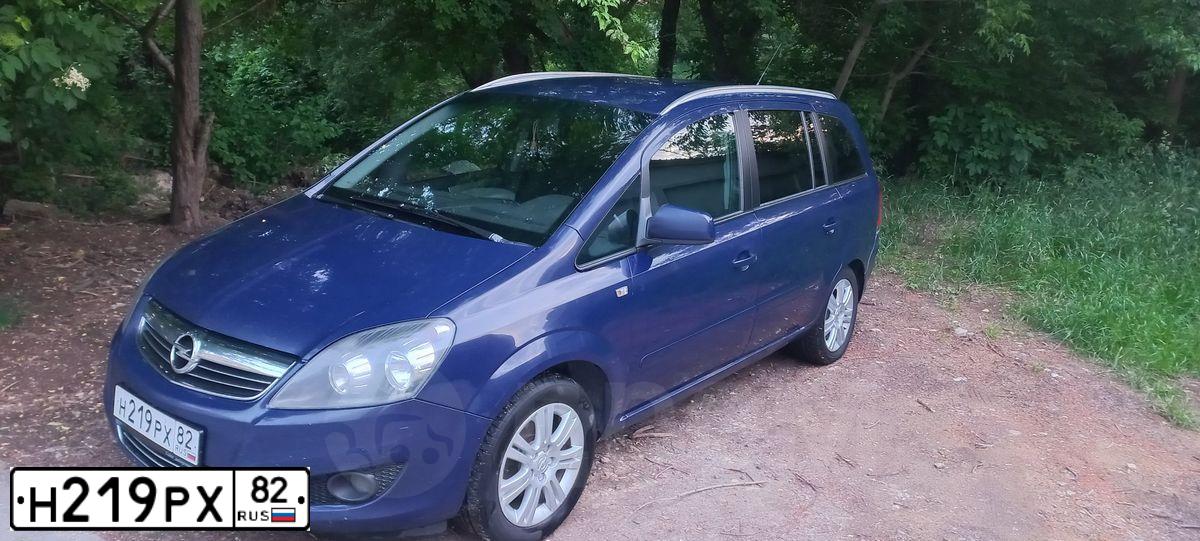 Фото автомобиля OPEL ZAFIRA, 2013 — госномер Н219РХ82. Цвет: синий