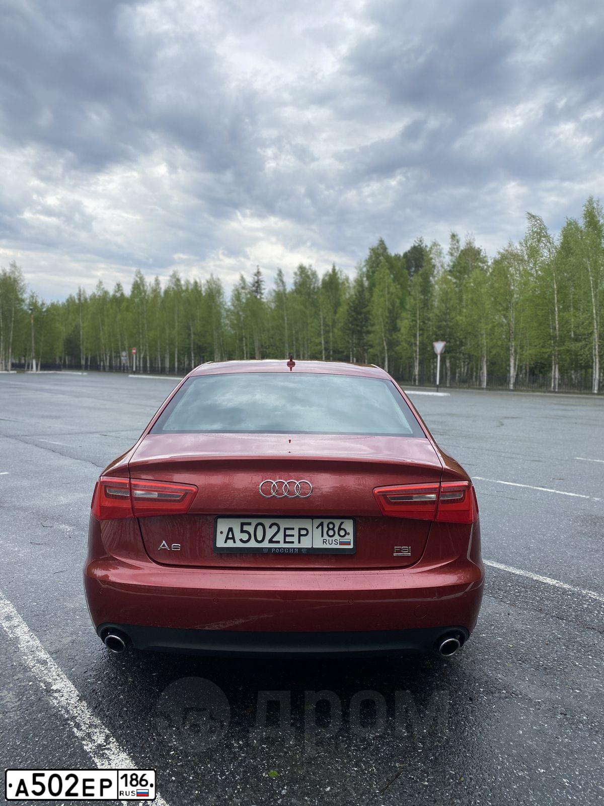 Фото автомобиля AUDI A6, 2012 — госномер В323ТЕ89. Цвет: ВИШНЕВЫЙ
