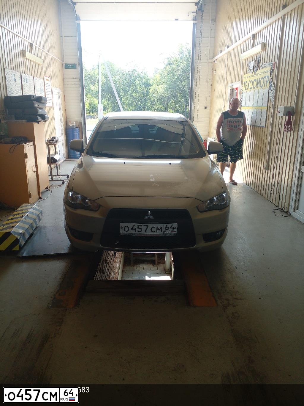 Фото автомобиля MITSUBISHI LANCER, 2008 — госномер О457СМ64. Цвет: БЕЖЕВЫЙ